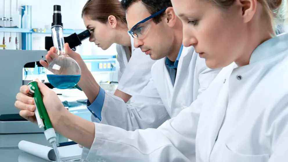 8021332 - group of students working at the laboratory
